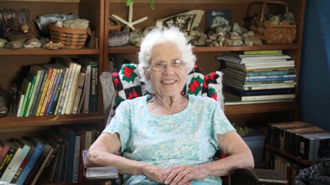 Phyllis Bembeck's home is full of books and well-groomed houseplants.