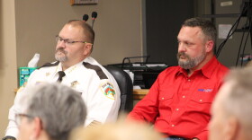 Sheriff Bryan Welk and his opponent, Deputy Aaron Ammerman, watch the forum preceding the sheriff's candidate forum Sept. 8, 2026, at Sylvan Town Hall in southern Cass County.