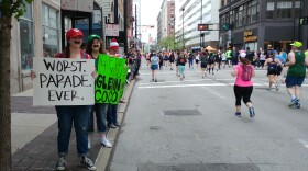 Spectators cheer on runners at the 2018 Flying Pig Marathon.