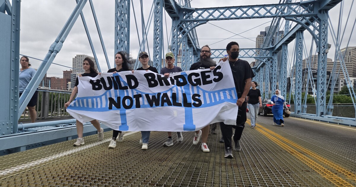 Covington Police arrest 13 people at anti-ICE march across Roebling Bridge