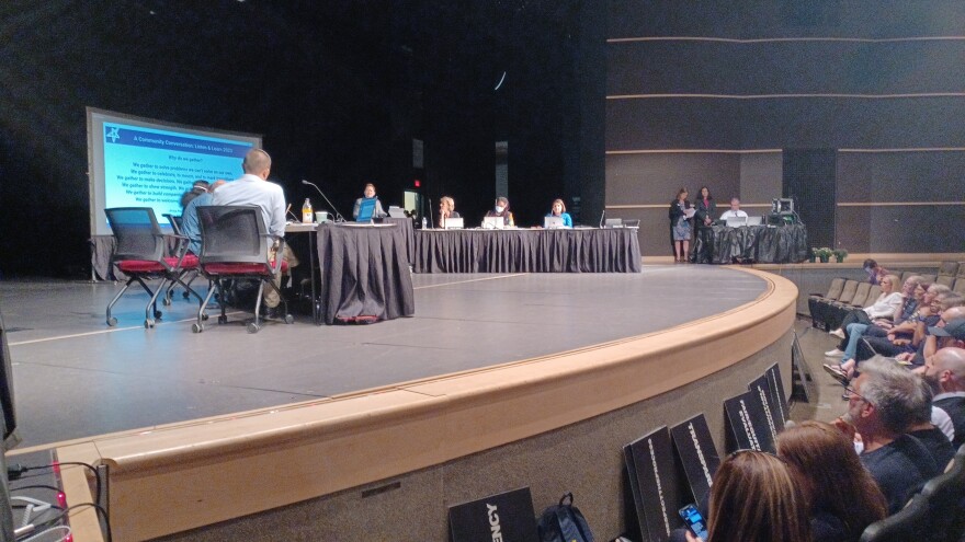 The Ann Arbor Board of Education listen to comments at the August 23, 2023 board meeting at Skyline High School.