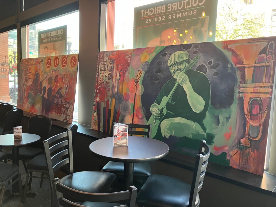 The completed Redstone Room paintings (the one at right depicting Ellis Kell), temporarily on the 2nd Street windowsill.