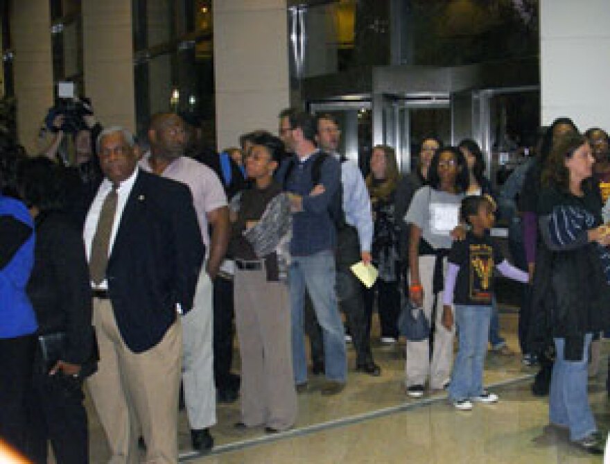 Lines to enter meeting chamber filled the Government Center lobby. align=left