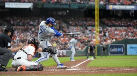 Kansas City Royals' Bobby Witt Jr. hits in an RBI single during the sixth inning of Game 1 of an AL Wild Card Series baseball game against the Baltimore Orioles, Tuesday, Oct. 1, 2024, in Baltimore.