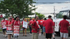 Workers picket outsdie Verizon Wireless store on Walden Avenue in Cheektowaga