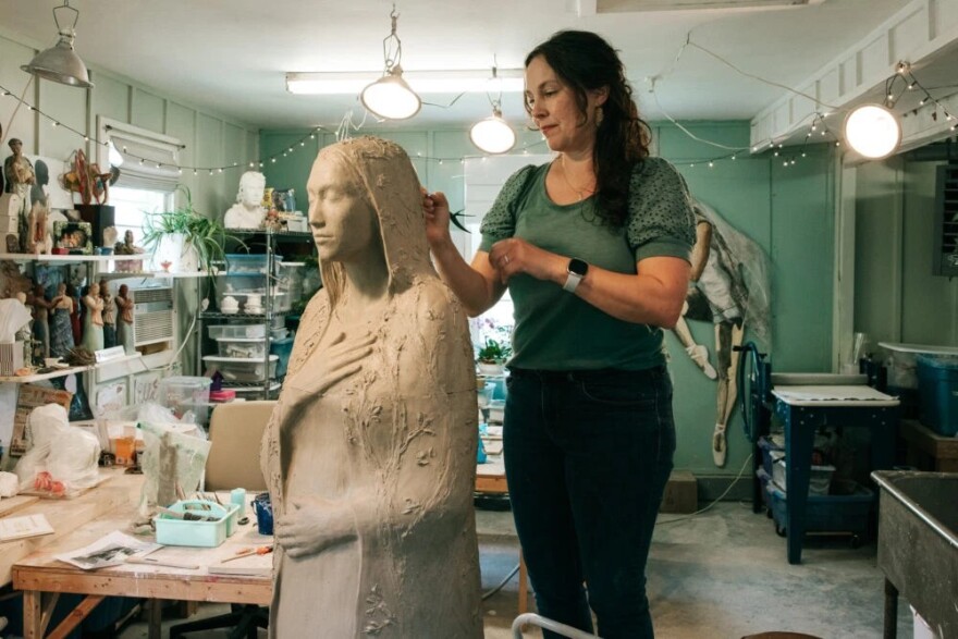 Artist Elaina Wendt Michalski works on a life-size sculpture of a Native American woman at her studio in Liberty, Missouri. The sculpture is part of the project Michalski completed in her residency program through the Johnson County Park and Recreation District.
