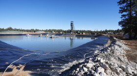 A pond at the Energy Fuels Inc. uranium Pinyon Plain Mine is shown on Wednesday, Jan. 31, 2024, near Tusayan, Ariz. The largest uranium producer in the United States is ramping up work just south of Grand Canyon National Park on a long-contested project that largely has sat dormant since the 1980s. (AP Photo/Ross D. Franklin)