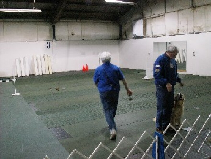 Irene Lynn sets up an obedience training ring at the BOTC.