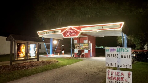 The entrance to the Ocala Drive-In lit up and welcoming on a warm fall evening.