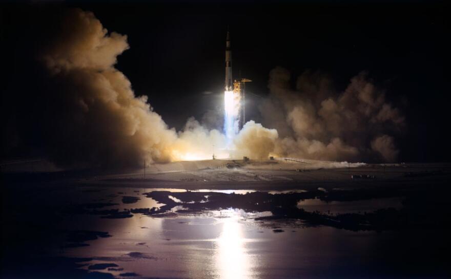 The huge, 363-feet tall Apollo 17 (Spacecraft 114/Lunar Module 12/Saturn 512) space vehicle is launched from Pad A, Launch Complex 39, Kennedy Space Center (KSC), Florida, at 12:33 a.m. (EST), Dec. 7, 1972. Apollo 17, the final lunar landing mission in NASA's Apollo program, was the first nighttime liftoff of the Saturn V launch vehicle. Aboard the Apollo 17 spacecraft were astronaut Eugene A. Cernan, commander; astronaut Ronald E. Evans, command module pilot; and scientist-astronaut Harrison H. Schmitt, lunar module pilot. Flame from the five F-1 engines of the Apollo/Saturn first (S-1C) stage illuminates the nighttime scene. A two-hour and 40-minute hold delayed the Apollo 17 launching.
