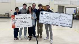 Stephanie Simmons (3rd from left) was named Middle School Teacher of the Year . She was surprised with the award at Corpus Christi School, April 8, 2026