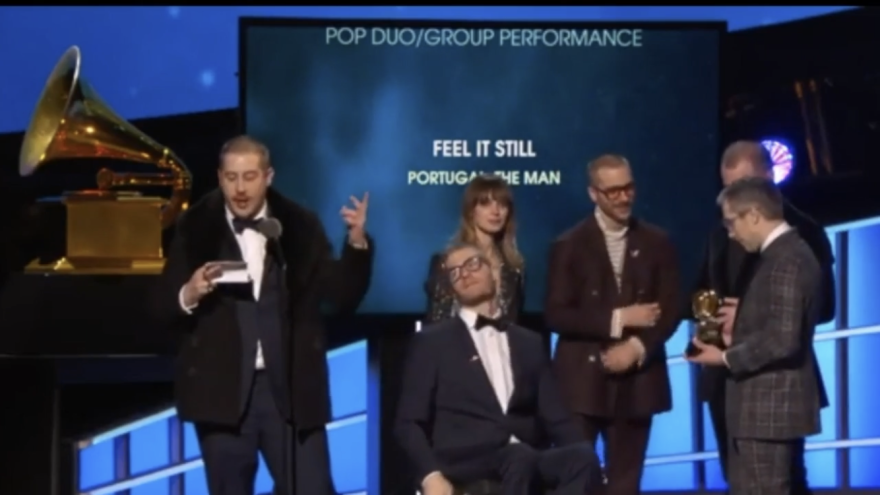 Portugal. The Man's Zach Carothers delivers an acceptance speech at the 60th annual Grammy Awards on Sunday after the band won an award for best pop duo or group performance for the song "Feel It Still." (Screengrab)