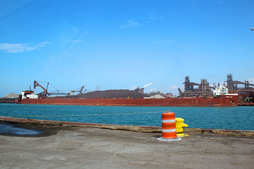 A semi-automated “laker” ship, the Stewart Cort, offloads iron ore at the steel-maker ArcelorMittal across from the Port of Indiana-Burns Harbor.
