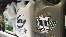 Containers of Roundup are displayed on a store shelf in San Francisco. (Haven Daley/AP)