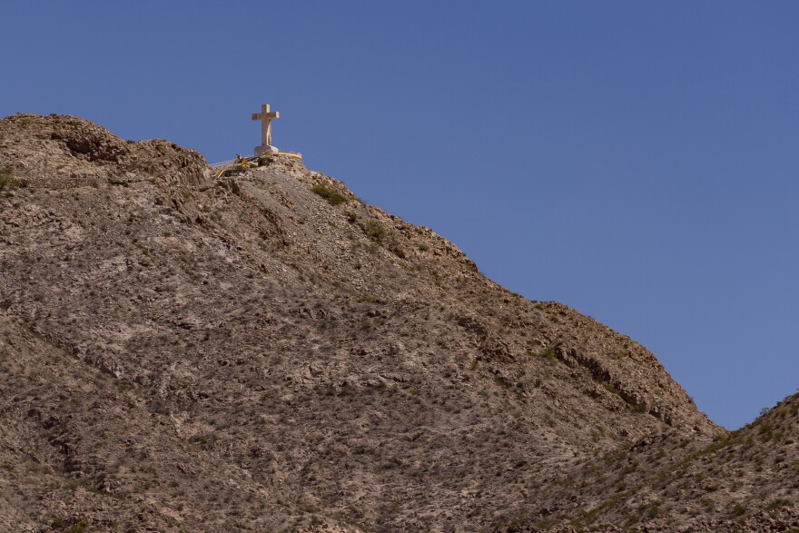 The Mount Cristo Rey monument sits atop a hill overlooking the U.S.-Mexico border wall near Sunland Park, N.M.