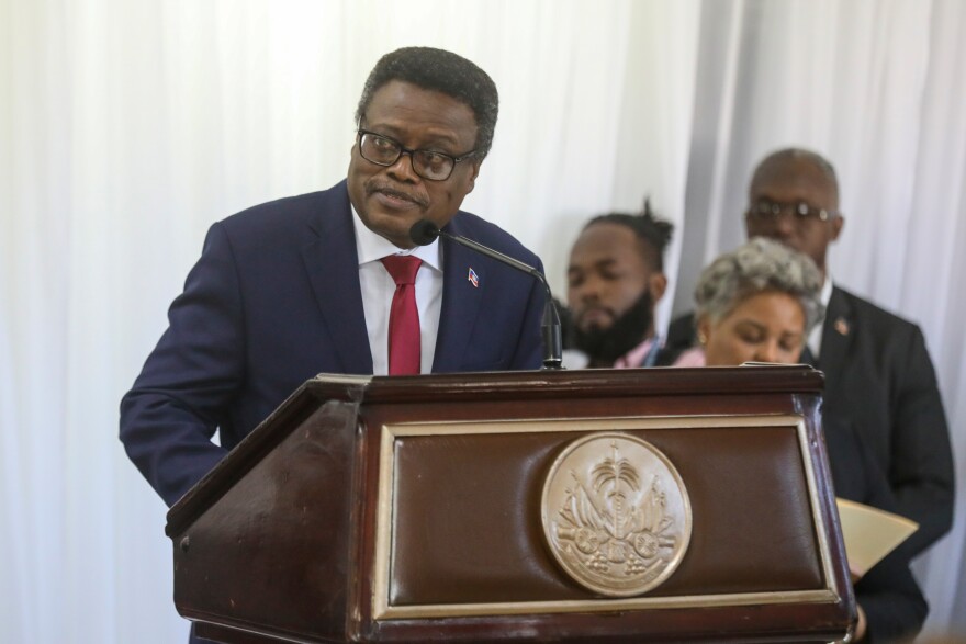 FILE - Fritz Alphonse Jean, an economist and former central bank governor, who replaced Leslie Voltaire in the rotating presidency of the transitional presidential council, speaks during his installation ceremony in Port-au-Prince, Haiti, March 7, 2025. (AP Photo/Odelyn Joseph, File)