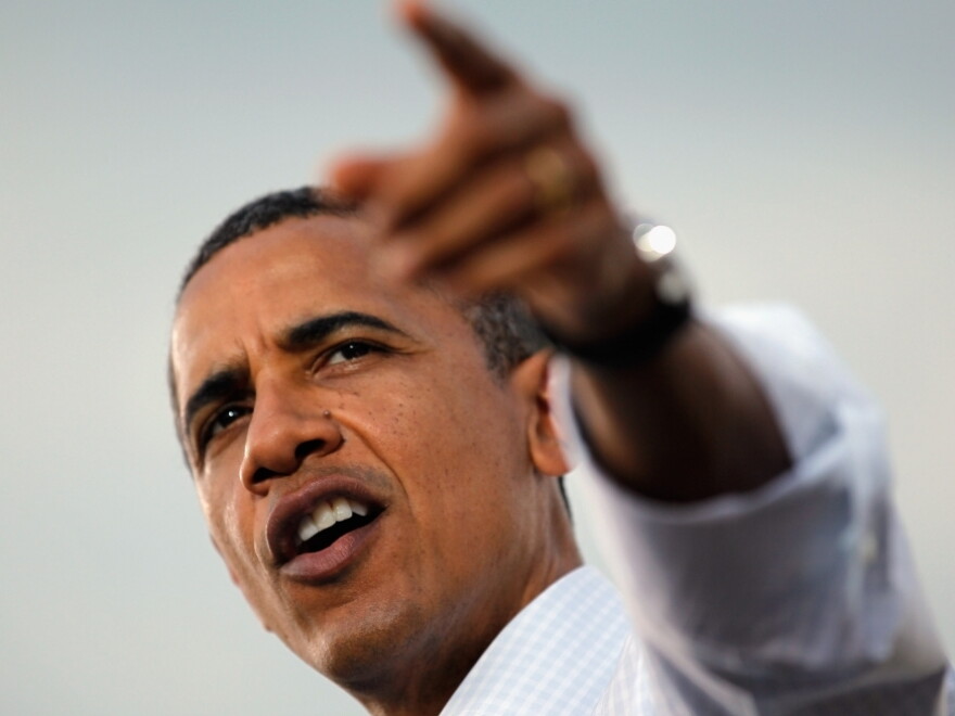 President Barack Obama speaks at a town hall style meeting on Aug. 17, 2011 in Alpha, Illinois. President  Obama was on the last day of a three-day bus tour of the Midwest during which he will discuss ways to improve the economy and  create jobs, and hear directly from Americans.