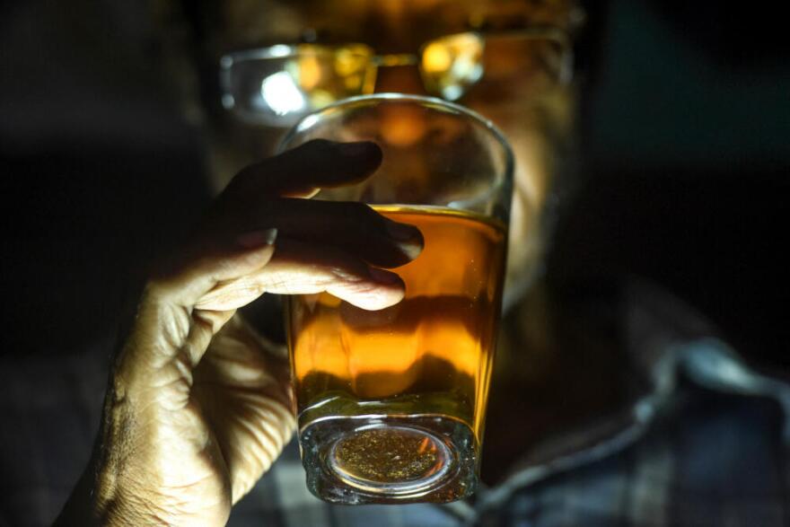 A man drinks a glass of alcohol Ashraf Khan (Asif Hassan/AFP via Getty Images)