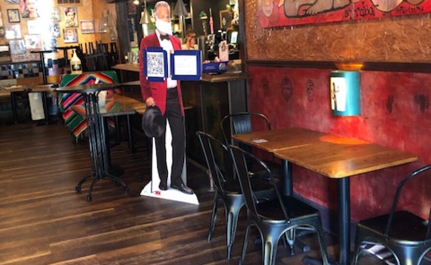 Indoor dining at El Loco, where tables are socially distanced.