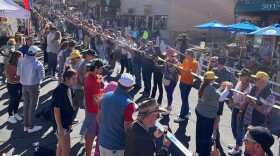 At Park City Shot Ski Saturday afternoon, 1,340 people lined up on Main Street for a group shot of either whiskey or apple juice.