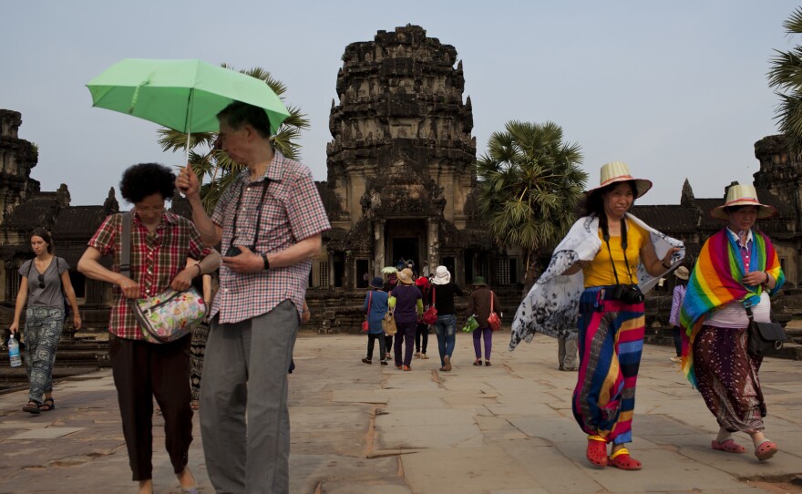 Tourists visit Angkor Wat in Siem Reap province, Cambodia, in April.