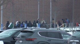 The protest just outside of Center Grove High School's Hall of Excellence.