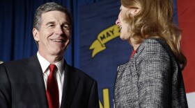 Democratic Gov.-elect Roy Cooper defeated incumbent Pat McCrory in a tight election. Cooper is seen here with his wife, Kristin, at an election night rally in Raleigh.