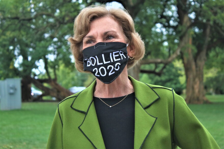 Barbara Bollier, a Kansas state senator running for the U.S. Senate, wears a mask after a September campaign rally at a Lenexa park.