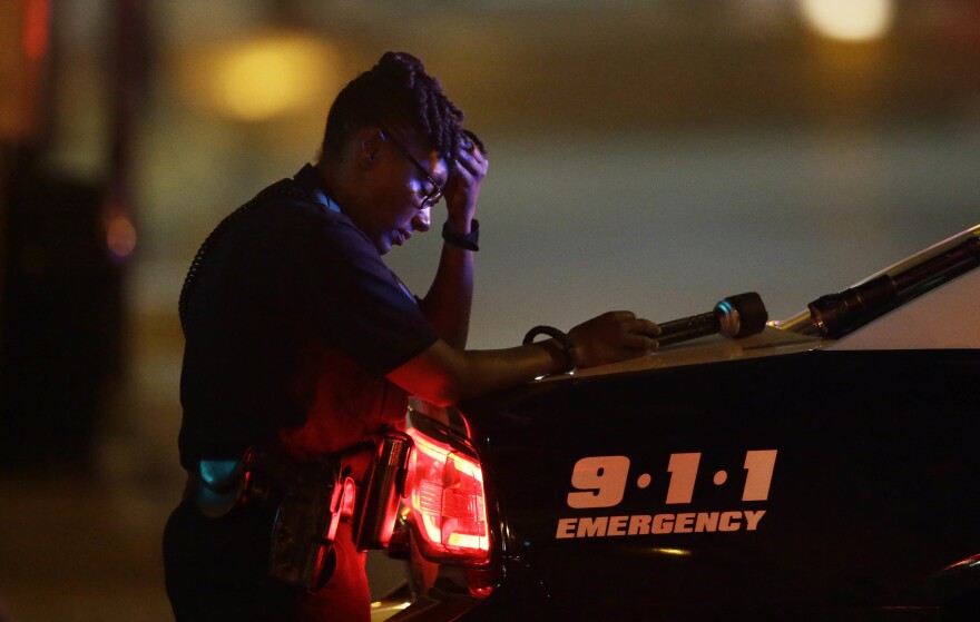 Photo of a police officer following the Dallas shooting