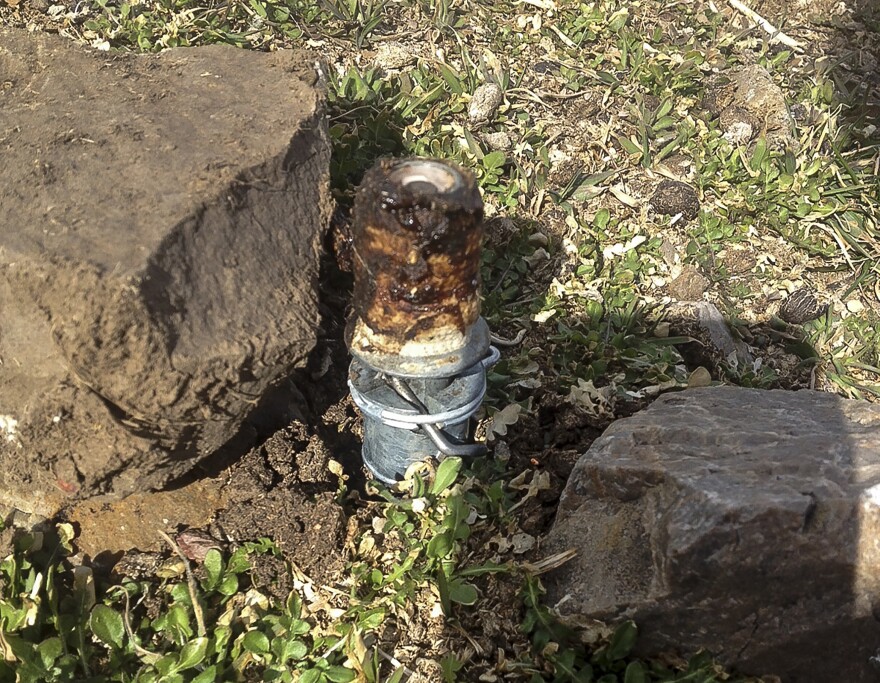 This photo shows an M-44 cyanide device in Pocatello, Idaho.