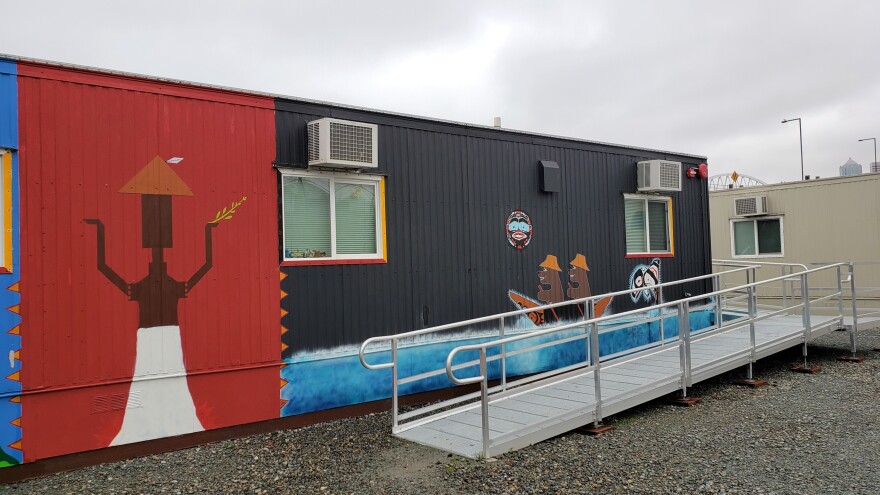 Residents are painting the exterior of each trailer in Eagle Village with Native imagery.