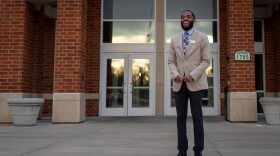 Marco Lee, a senior and student government president at Lindenwood University, poses in front of his dorm on the St. Charles campus on Dec. 7, 2020.