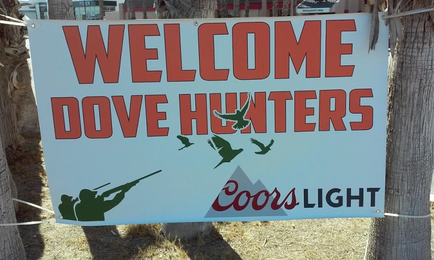 A sign welcomes dove hunters to Yuma.