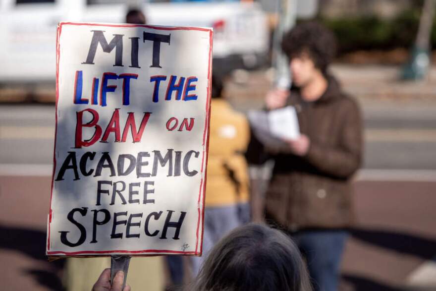 A sign at a student rally on Massachusetts Ave. at MIT, urges the university to "lift the ban on academic free speech." (Robin Lubbock/WBUR)