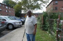 Mable Wilson, a 76 year old resident of the Pioneer Homes public housing complex in Syracuse, uses a cane to balance herself as a result of her hearing issues. The issue could be resolved with hearing aids, which she has gone years without.