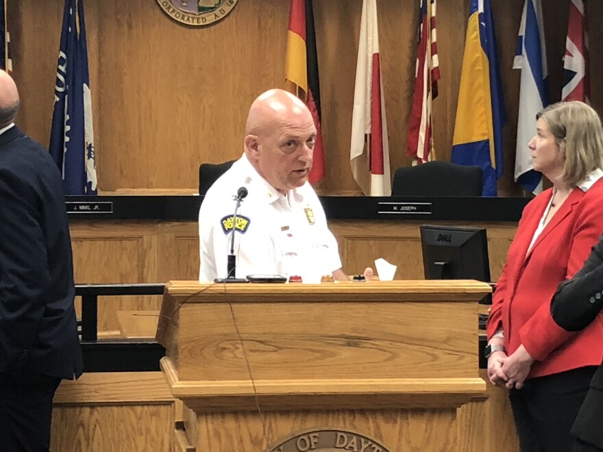 Major Paul Saunders of the Dayton Police Department speaks at the podium at Dayton City Hall. He explained how to use the transparency portal, an online tool that tracks their police reform process.