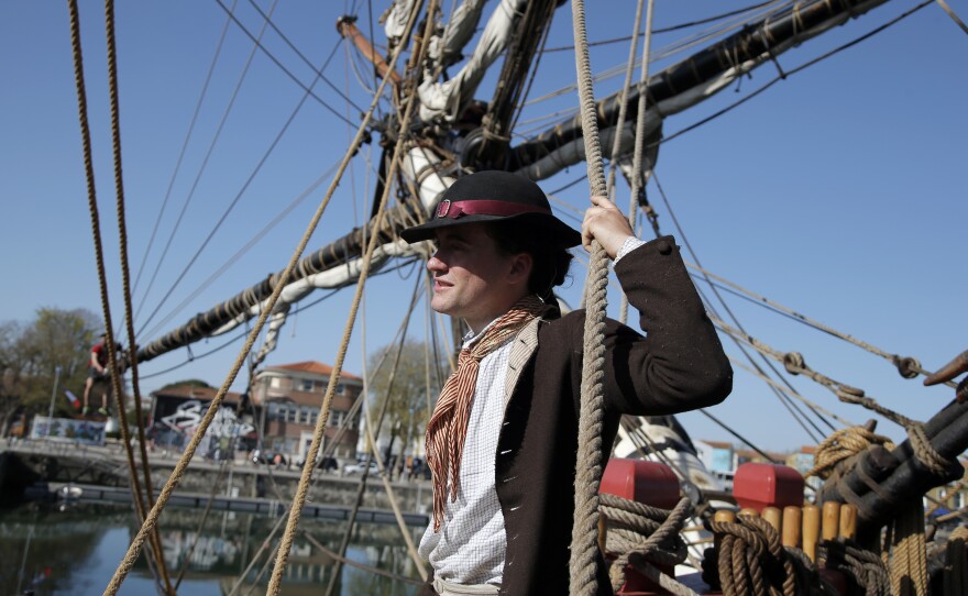 Adam Hodges-LeClaire is outfitted as an 18th century sailor, down to his woolen socks and leather buckle shoes.