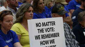 Dana Hanson, center, an organizer for We Are Mercer County, sits in the crowd listening to the Mercer County Fiscal Court during a Sept. 28 meeting.