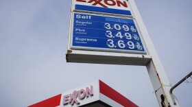 Shown is an Exxon service station sign in Philadelphia, Wednesday, April 28, 2021. Exxon Mobil swung to a hefty profit in its third quarter, thanks to increased demand for oil and higher prices, Friday, Oct. 29.