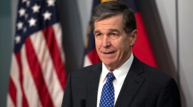 Then-Gov. Roy Cooper speaks during a 2021 news conference in Raleigh.