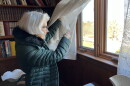 Mary Gallerani looks out toward the Sagamore Bridge from the house on Cecilia Terrace where she has lived since 1958.
