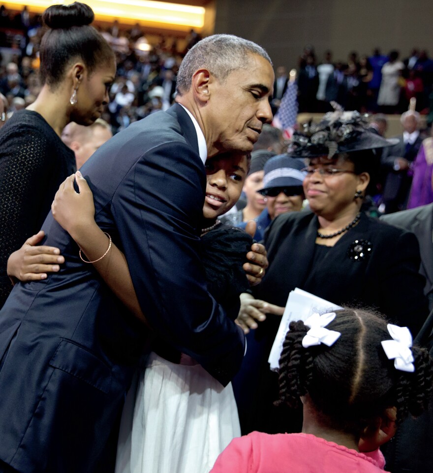 "Greeting family members of Reverend Clementa Pinckney at the conclusion of his funeral service in Charleston, S.C. Reverend Pinckney was killed in a mass shooting and hate crime in which a white supremacist murdered nine African Americans during a prayer service at Emanuel African Methodist Episcopal Church."