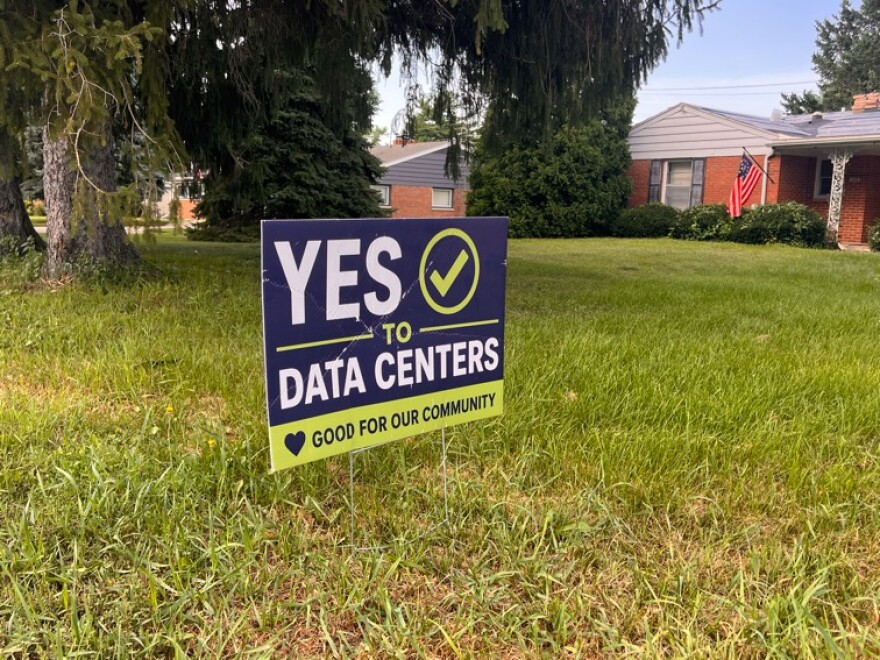 A yard sign supporting data centers
