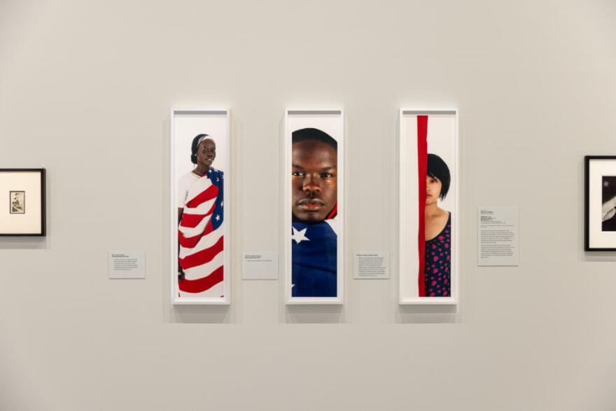 “Jenny Liu,” “Charles Cauthen,” and “Mari Agory” by Sheila Pree Bright in “American Icon: The U.S. Flag in Art” at the National Gallery of Art in Washington, D.C. (Courtesy of Farrah Skeiky for NPR)
