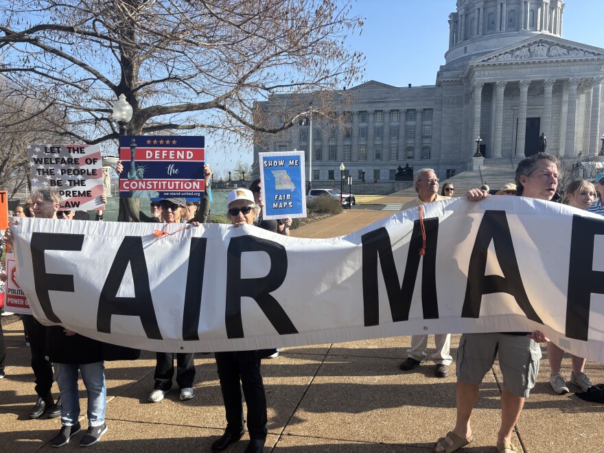 Protestors hold a sign outside of Missouri's Supreme Court on March 10, 2026. The protest was organized by People Not Politicians, a group currently working to get Missouri's redistricted map on November's ballot.