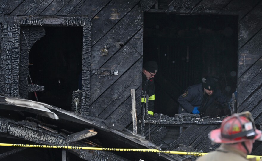 Crews work at the scene of a fatal fire at 66-68 N. Welles St., Kingston, on Thursday, Feb. 12, 2026. 