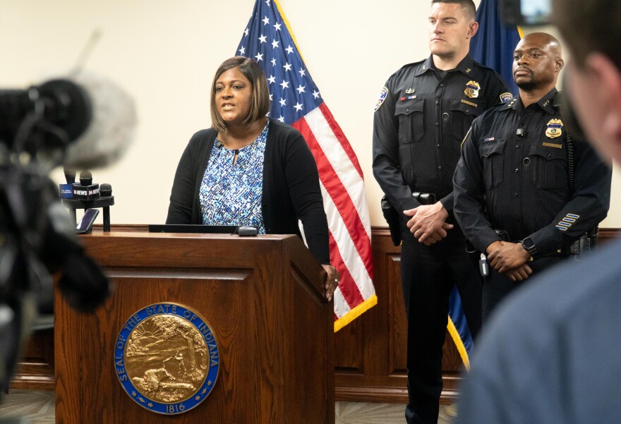 Evansville Mayor Stephanie Terry said, "this is a senseless act of violence. It was devastating to see in the instant the suspect chose to pull the trigger, lives were shattered, including his own." Terry, according to Police Chief Philip Smith, was at the hospital at 2 a.m. immediately after the shooting to see Officer Taylor. Pictured with Terry are Smith (right) and Evansville Police Sgt. Anthony Aussiecker.