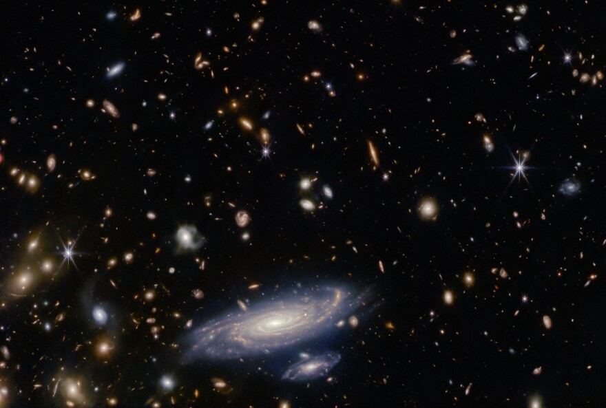 NASA's James Webb Space Telescope captured this image of a large spiral galaxy nmed LEDA 2046648. It's over 1 billion light-years from Earth and located in the constellation Hercules.
