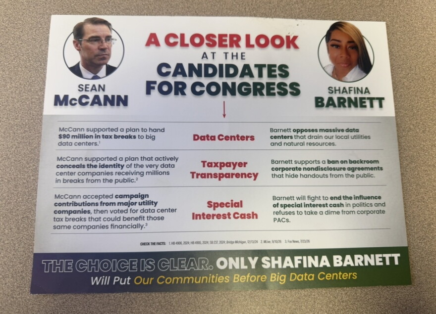 A flyer reads "A closer look at the Candidates for Congress", and shows two side-by-side photos of Sean McCann (left), a white man wearing glasses and a suit, and Shafina Barnett, a Black woman in a white collared shirt. Below the photos, a chart shows claims about each candidate's policies on three topics: Data Centers, taxpayer transparancy, and special interest cash. The bottom of the flyer reads: "The Choice is Clear. Only Shafina Barnett Will Put Our Communities Before Big Data Centers".