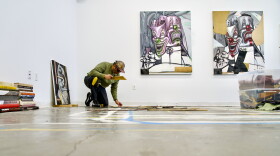 Artist Edgar Serrano works in his studio at NXTHVN.